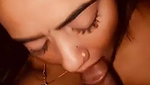 Sexy housewife giving a blowjob while being naked