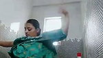 Beautiful girl after bath wearing dress in bathroom