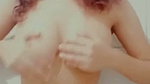 Beautiful cute girl pressing her boobs  enjoying
