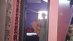 After taking bath aunty wearing dress