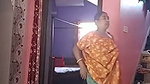 After taking bath aunty wearing dress