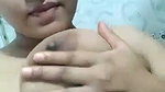 Sexy girl pressing her huge boobs