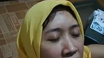 Hijabi slut takes clients cum on her face