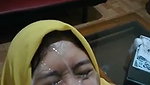 Hijabi slut takes clients cum on her face