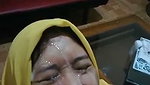 Hijabi slut takes clients cum on her face