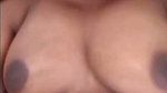 Tamil aunty pressing her huge boobs  showing