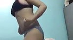 Sexy girl strips  nude dancing