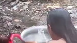 Hot girl bathing outdoor  show her boob