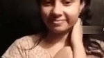 Shy girl showing her boobs