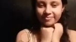Shy girl showing her boobs