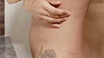 Sexy model showing her hot figure  tattoo