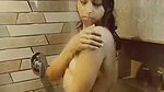 Beautiful girl showing  taking shower in hotel bathroom