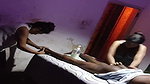 Two ladies giving massage  men show his ass