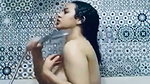 Sexy girl taking shower