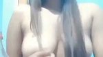Beautiful hot girl pressing her boobs