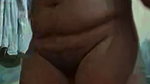 Lady strips and fingers her pussy in an Indian xx