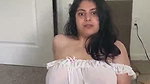 Beautiful girl show her boobs in transparent dress