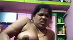 Hot bhabhi inserting brinjal inside her pussy