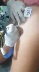 Cute chubby girl having tattoo on pussy