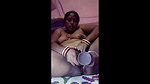 Aunty drilling her pussy with purple dilo