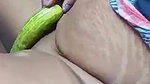 Aunty inserting cucumber inside her pussy
