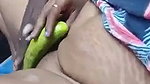 Aunty inserting cucumber inside her pussy