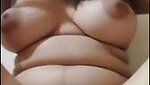 Beautiful girl pressing her boobs  showing her pussy