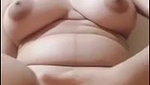 Beautiful girl pressing her boobs  showing her pussy