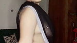 Beautiful girl show her boobs in transparent black saree
