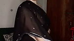 Beautiful girl show her boobs in transparent black saree
