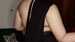 Beautiful girl show her boobs in transparent black saree