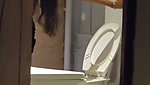 New update sexy girl pissing showing her boobs