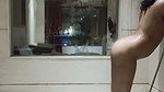 Sexy girl showing her hot figure in hotel bathroom