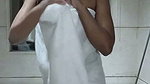 Sexy girl showing her hot figure in hotel bathroom