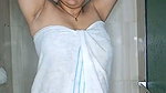 Beautiful aunty showing her sexy figure while bathing