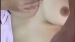 Beautiful girl showing her huge boobs  pressing