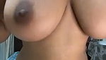 Sexy beautiful girl showing her huge boobs