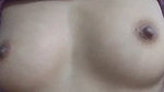 Beautiful girl pressing her own boobs