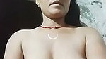 Village aunty pissing  showing her boobs