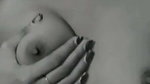 Beautiful slim girl pressing her boobs