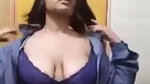 Sexy girl undress  showing her huge boobs