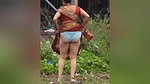 Aunty pissing in open area