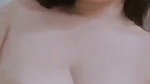 beautiful girl showing her boobs  pressing