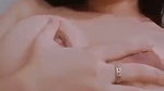 beautiful girl showing her boobs  pressing
