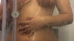 Beautiful girl taking shower  showing