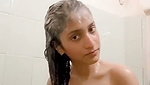 Beautiful slim girl taking bath