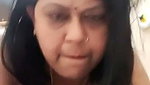 Mature housewife showing her hot figure  shaking her body
