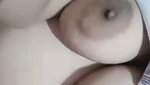 Beautiful girl pressing her nipple