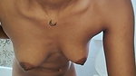 Beautiful slim girl showing her nude body in bathroom