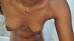 Beautiful slim girl showing her nude body in bathroom